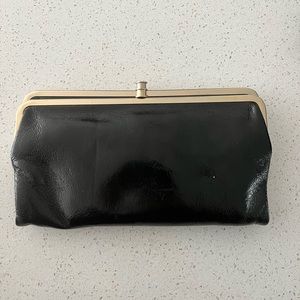 HOBO Lauren wallet clutch in black with gold hardware